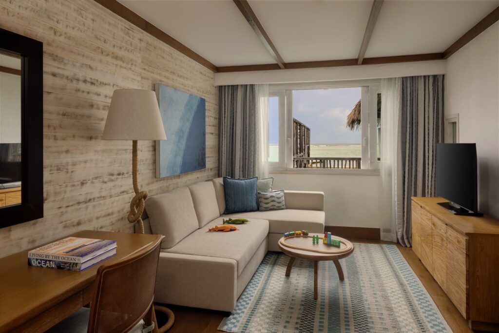 Family Water Villa with Pool Wohnzimmer